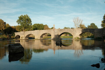 Wall Mural - View to the Balthasar Neumann bridge with the river Tauber near the town Tauberrettersheim.