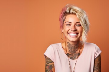 young woman with neck and face tattoos happy smiling laughing