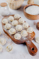 Poster - Russian homemade meat dumplings pelmeni.