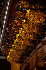 Brilliant and luxurious Chinese-style building with gold wood carving ceiling