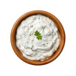 Top view of blue cheese dip in a wooden bowl isolated on a white background