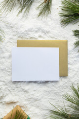 Poster - Christmas decorations and white card with copy space on snow background