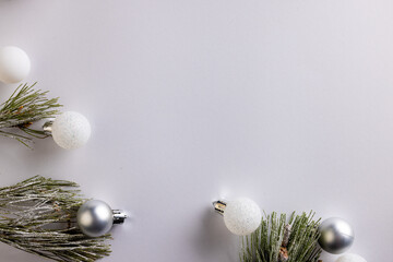 Wall Mural - Christmas baubles decorations with copy space on white background