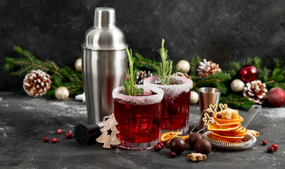 Wall Mural - Red christmas cocktail with cranberries in a glasses.