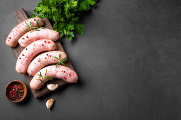 Wall Mural - Raw sausages with spices and rosemary