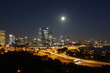 Perth City from Kingspark at night with moon and skyline