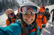 © Andrii  - Smiling Skiers Capture Group Selfie