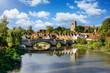 Panoramic view of Aylesford village in Kent, England with medieval bridge over the river Medway and church