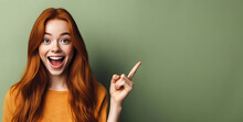 An Excited Young Ginger Teenage Girl Smiling And Pointing Her Index Finger Up At The Copy Space Expressing Wow Emotion Standing Isolated On Green Background Studio Copy Space, Advertisement Concept