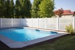 vinyl panel fencing around an in-ground swimming pool