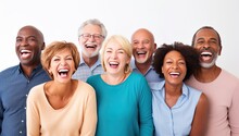 A Group Of Joyful People Of Different Races And Ages Happily Laughing On A White Background. Concept Of Advertising Dentist And Healthy Teeth.