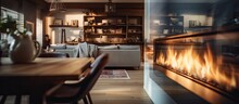 Loft Style Living Room With Wooden Table Fireplace And A Blurred Person Passing By With Copyspace For Text