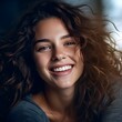 Portrait beautiful brunette model woman with white teeth smile, healthy brown hair and beauty skin Concept of advertising dentist dental and facial care. 