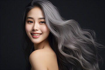 Wall Mural - Beautiful grey hair asian woman smiling with smooth face skin.