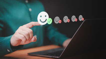 Fototapete - User hand touch virtual screen on smile face icon to give satisfaction in opinion and service. Customer satisfaction survey, testimonial feedback review, service experience rating online application.