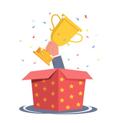 Wall Mural - hand with gold cup sticks out of open red gift box with golden stars, falling confetti on background