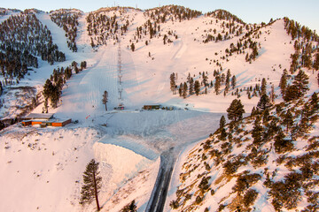 Poster - Aerial view of a Snow covered Ski Resort in the Mountains above Reno and Lake Tahoe Nevada at sunrise.