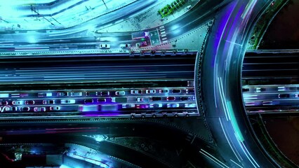 Financial technology, energy power, beautiful top view time-lapse of car traffic at roundabout lane and buildings. 4K drone aerial zoom out. Urban cityscape concept or abstract of advanced innovation.