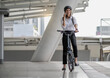 © Nassorn - Eco friendly, businesswoman ride bicycle in urban to reduce carbon footprint. Beautiful woman environment preservation person commuting with bicycling. Cycling, alternative transport for clean energy.