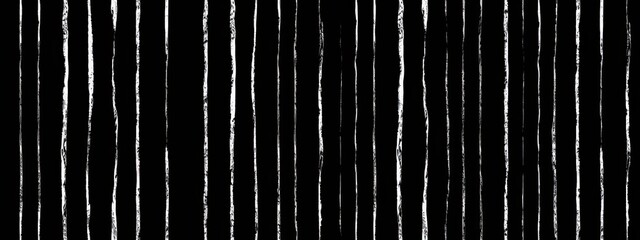 Seamless vertical pinstripe pattern made of fine wonky white stripes on black background. Abstract simple classic blender motif with linocut print texture in a trendy doodle line art style