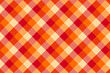 Autumn Plaid patten background. Vector fall checkered red, orange and yellow plaid textured background. Traditional diagonal fabric print. Flannel plaid texture for fashion, print, Halloween design