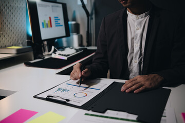 Fototapete - Businessman accountant working audit and calculating expense financial annual financial report balance sheet statement