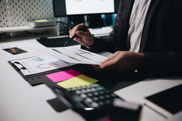 Fototapete - Businessman accountant working audit and calculating expense financial annual financial report balance sheet statement