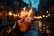 © Sebastian - Close up shot of hands holding sparklers. Generative Ai.