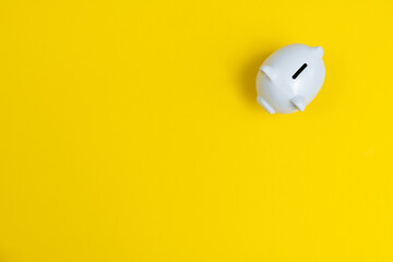 Poster - Piggy bank on yellow background