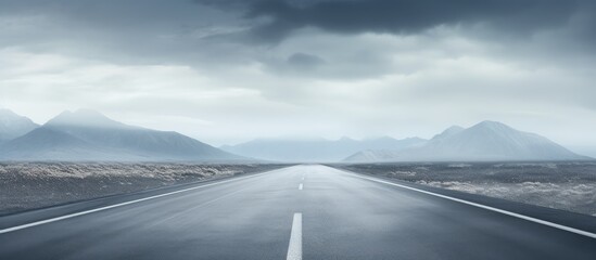 Canvas Print - Blurred asphalt road on a moody day With copyspace for text