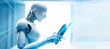 © Nitcharee - Artificial intelligence humanoid robot working on tablet with technology hologram, data network connection background