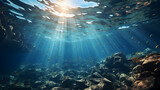 Fototapeta Do akwarium - Underwater view, sun rays in background.