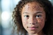 A young scientist with a birthmark on her face, using her research to educate others about the psychological effects of living with a visible difference. She hopes to break societal stigma