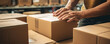 © Michal - Detail on the hands of a worker in parcel service. generative ai