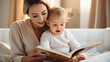 © Atchariya63 - Mother sits on a cozy bed eading a book with her child at home