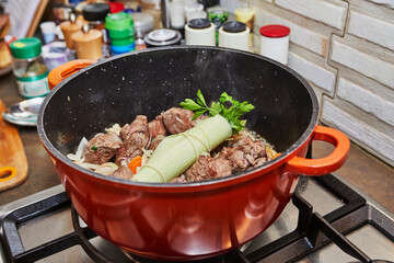 Wall Mural - Prepared bouquet or bunch of greens in pan with cooking meat for taste and smell