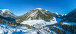 canvas print picture - Winter im Namloser Tal in Tirol, Blick auf das Dorf und zur Knittelkarspitze
