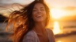 Portrait of calm happy smiling free woman with open arms and closed eyes enjoys a beautiful moment life on the seashore at sunset time