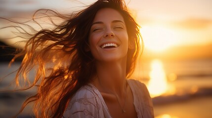 Wall Mural - Portrait of calm happy smiling free woman with open arms and closed eyes enjoys a beautiful moment life on the seashore at sunset time