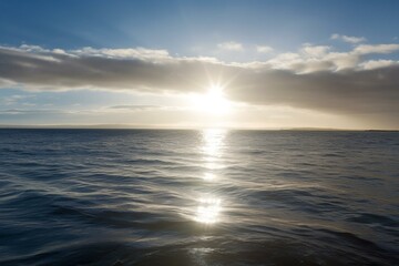  Sunbeams shimmering on tranquil ocean. Generative AI