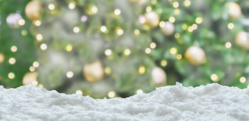 Wall Mural - Empty white snow with blur Christmas tree with bokeh light background