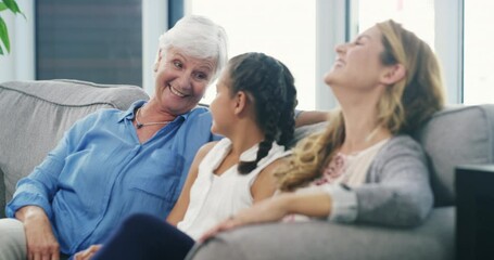 Sticker - Family, love and generations of funny women on a sofa in the living room of their home together. Grandma, mother and daughter laughing in an apartment to visit her grandparent during retirement