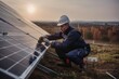 Engineer working on a photovoltaic solar panel at sunset, A worker assembling solar panels an ecological way, AI Generated