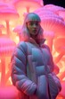 © Glittering Humanity - A stunning winter portrait of a woman in a puffy magenta coat, her neon mushroom earrings glowing in the soft light as she exudes a fierce beauty against the backdrop of a cold and barren landscape