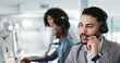 © N Felix/peopleimages.com - Call center, face or man speaking in CRM, telemarketing or telecom office for online customer services. Microphone headset, computer or sales agent in tech support help desk for consulting or talking