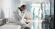 © N Felix/peopleimages.com - Stress, grief or mistake with a mature doctor in a hospital looking unhappy for healthcare or medical. Depression, fail or loss with a sad man medicine professional in a professional medicare clinic