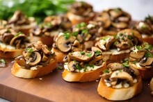 Fresh Sliced Mushrooms On Top Of Golden Toasted Bruschetta