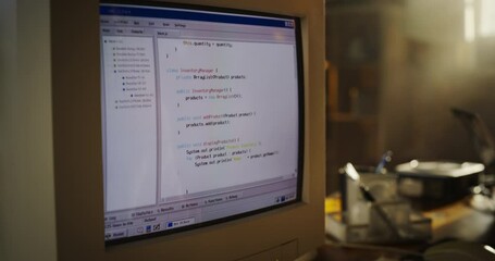 Fototapete - Zoom In Shot Of Hispanic Female Software Engineer Programming on Old Desktop Computer In Retro Garage. Focused Woman Starting Tech Startup Company In Nineties. Coding Innovative Online Service At Home