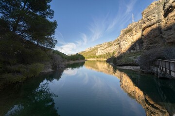 Wall Mural - Beautiful natural landscape with reflections of the sky on the water. Buendia. Cuenca