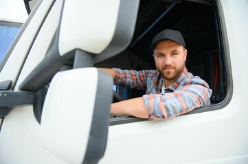 Close up of truck driver behind steering wheel. Copy space.